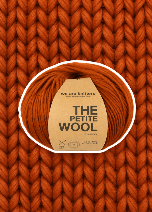 Petite Wool Cinnamon skein on matching knit background